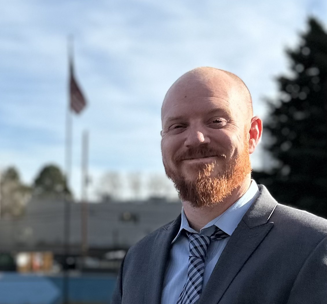 Shannon stand by Flag